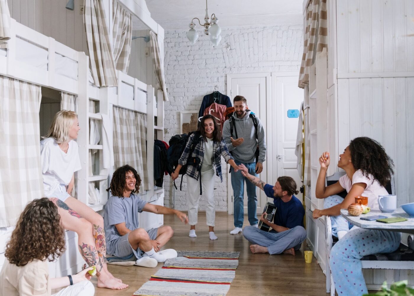 Parents helping a college freshman move into a dorm room