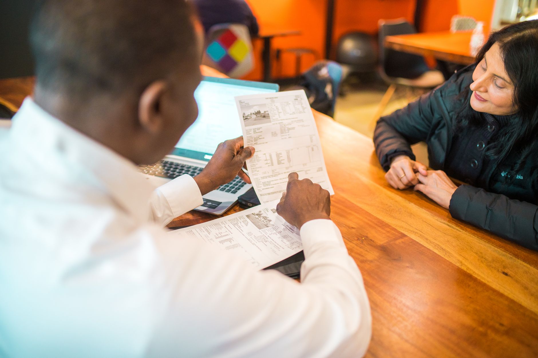 Advisor walking a client through fee structures