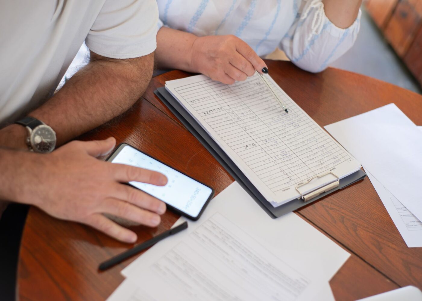 Retired couple reviewing their Medicare drug plan notice at home