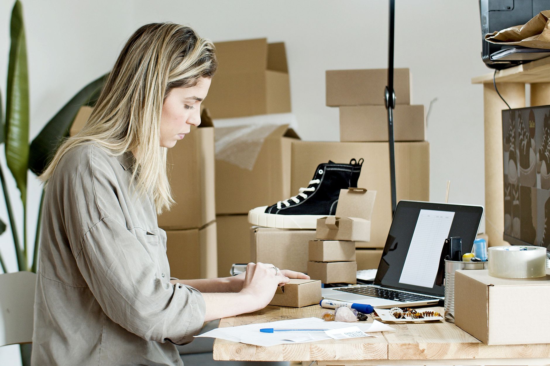 Shopper browsing discounted items on a laptop during an online sale